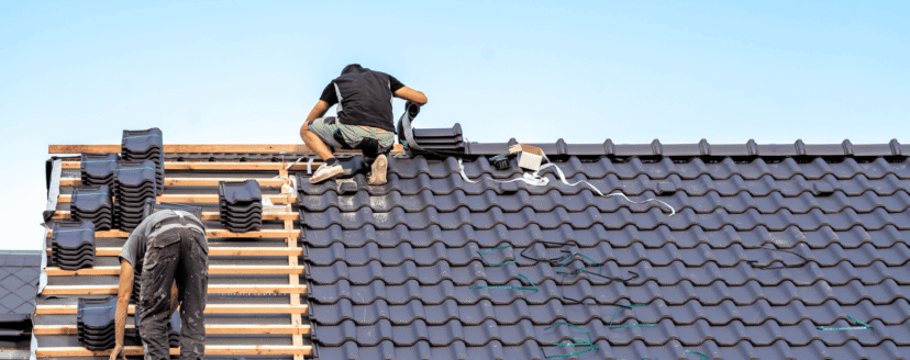 craftsman-builds-a-new-roof-from-ceramic-tiles-2026-01-07-02-14-00-utc