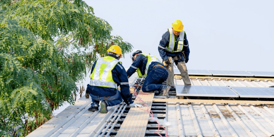 workers-installing-solar-panels-for-efficient-ene-2026-01-07-07-00-39-utc